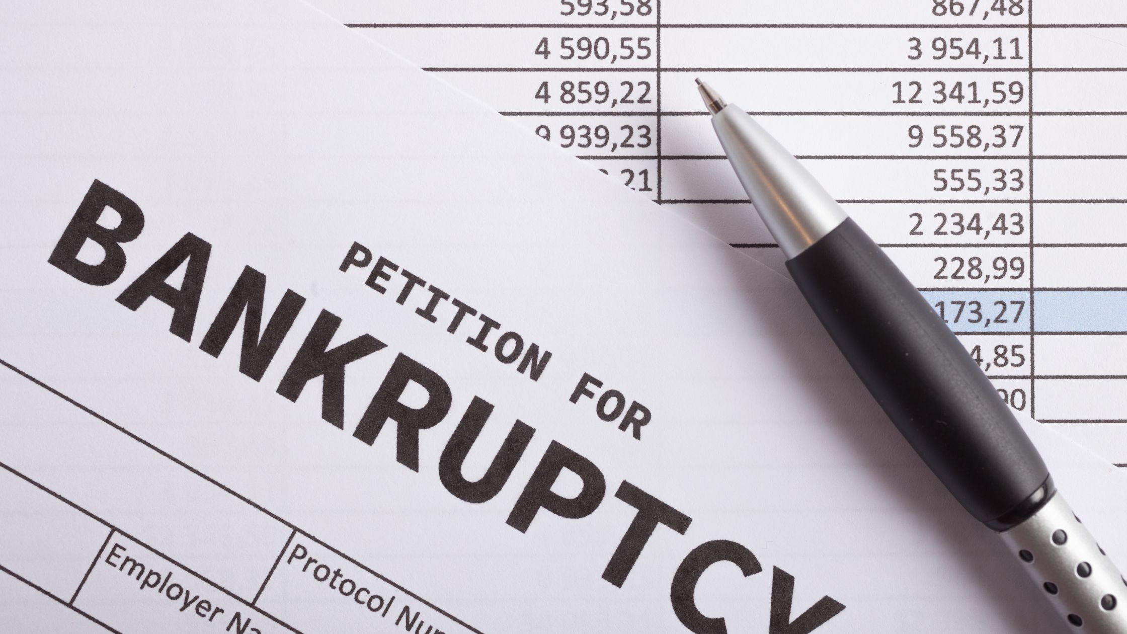 paperwork titled with file to bankruptcy