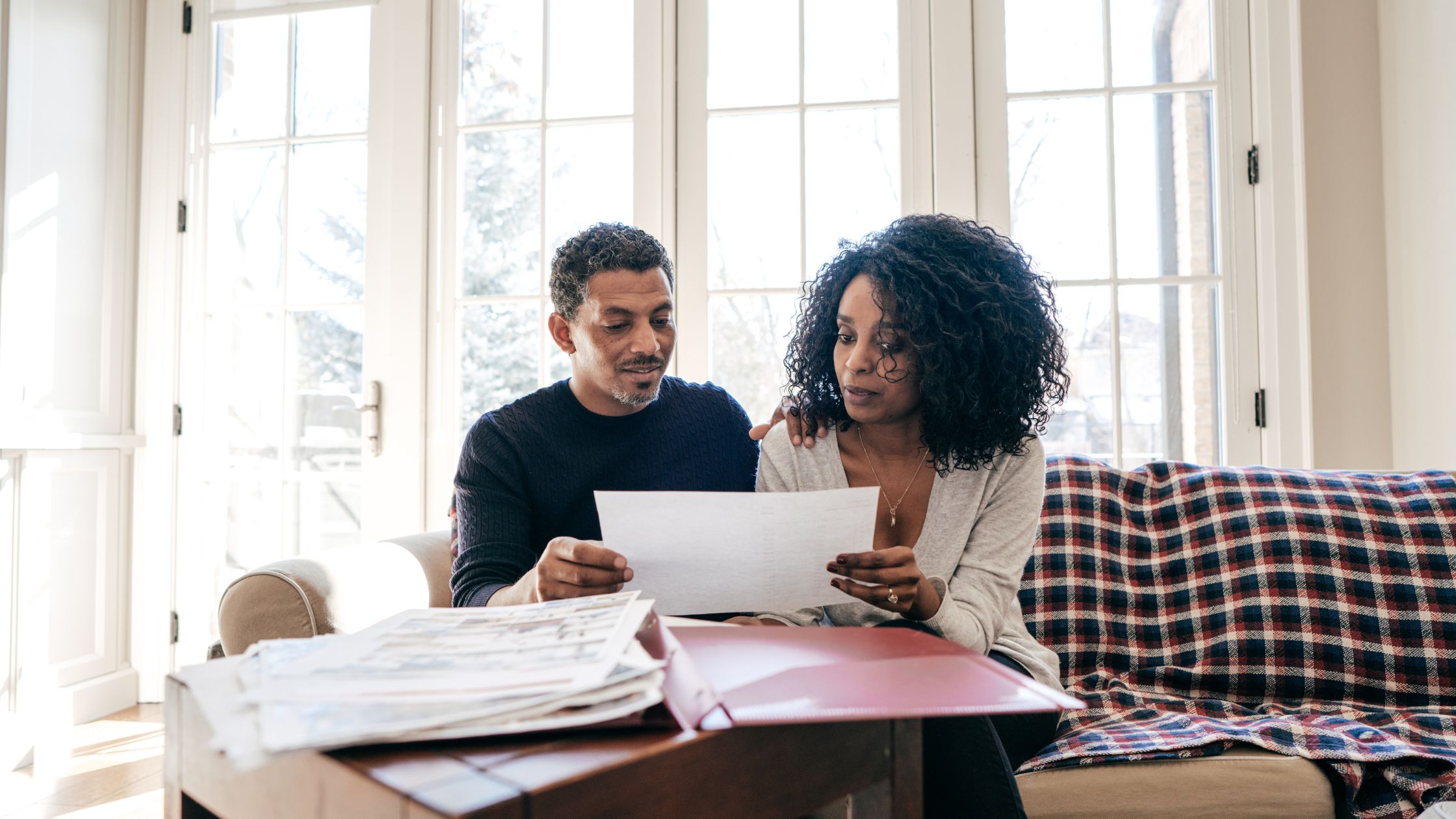 couple reviewing paperwork